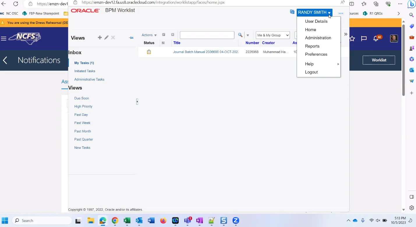 Screenshot of the Oracle BPM Worklist interface showing a journal batch approval task assigned to the user Randy Smith. The task is titled “Journal Batch Manual 2336690” and was created by Muhammad Hamza Hanif. The menu under Randy Smith’s profile is expanded, showing options like User Details, Home, and Logout.
